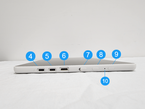 Image of the side edge of the pen display showing the location of ports, buttons, and the Status LED referenced in the table